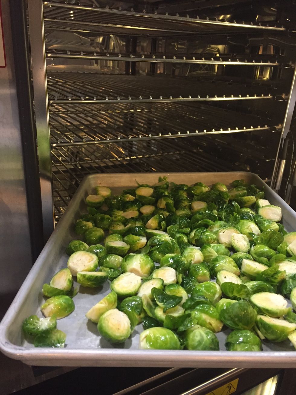 Place brussels sprouts into the preheated oven.
