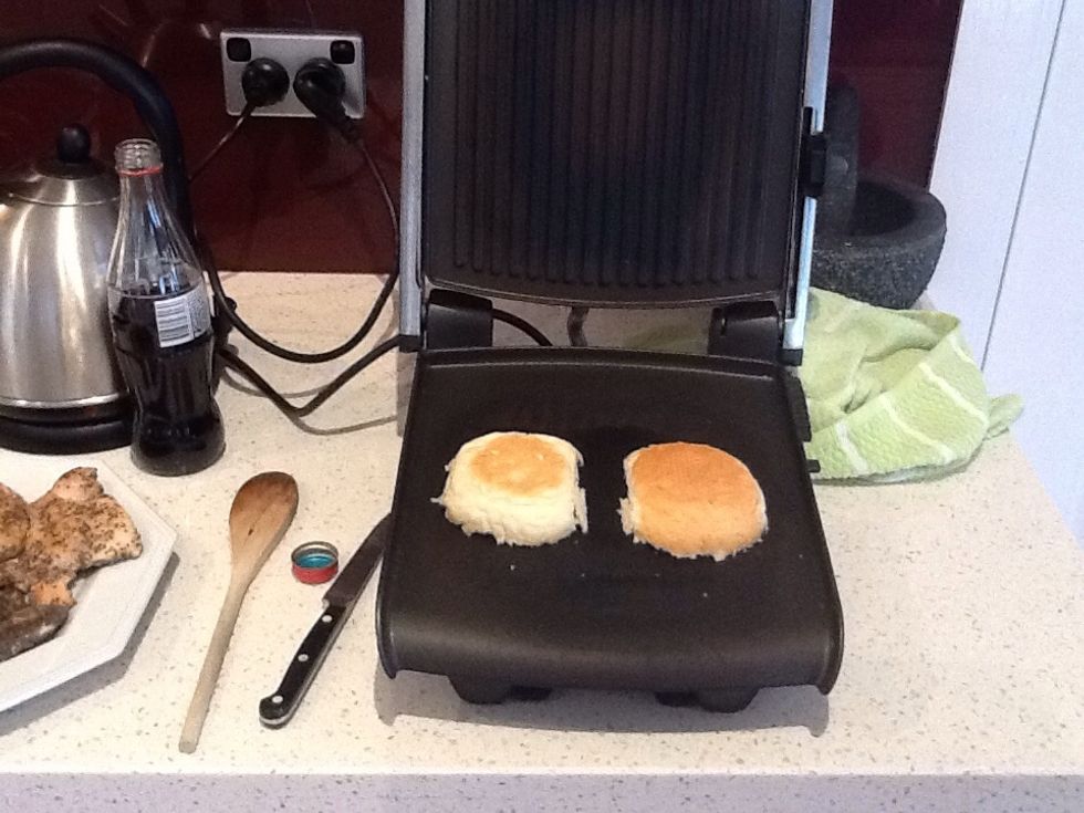 Place burger bun on a toaster for a few seconds or until warm and crispy
