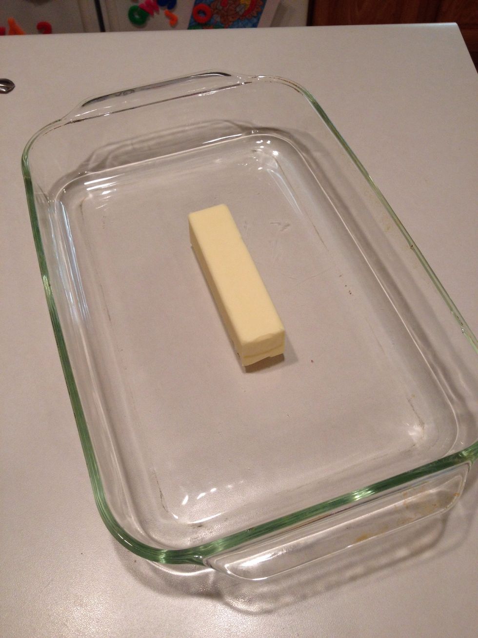 Place butter in casserole dish.