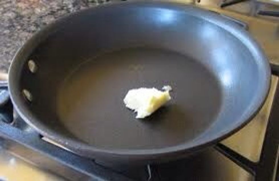 Place butter in pan on stove top and then set to mid to hot heat and move the butter around until whole pan is covered, you may need to add more butter.