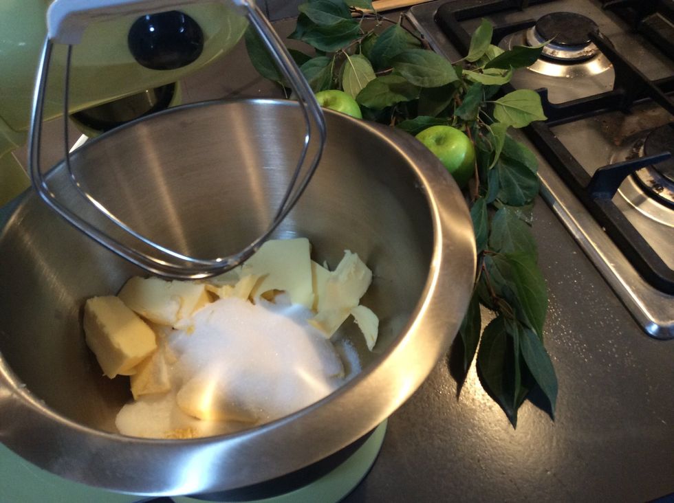 place butter,lemon rind and sugar in the bowl of an electric mixer