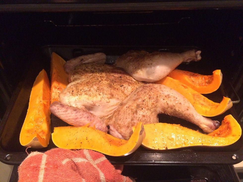 Place butternut squash around chicken