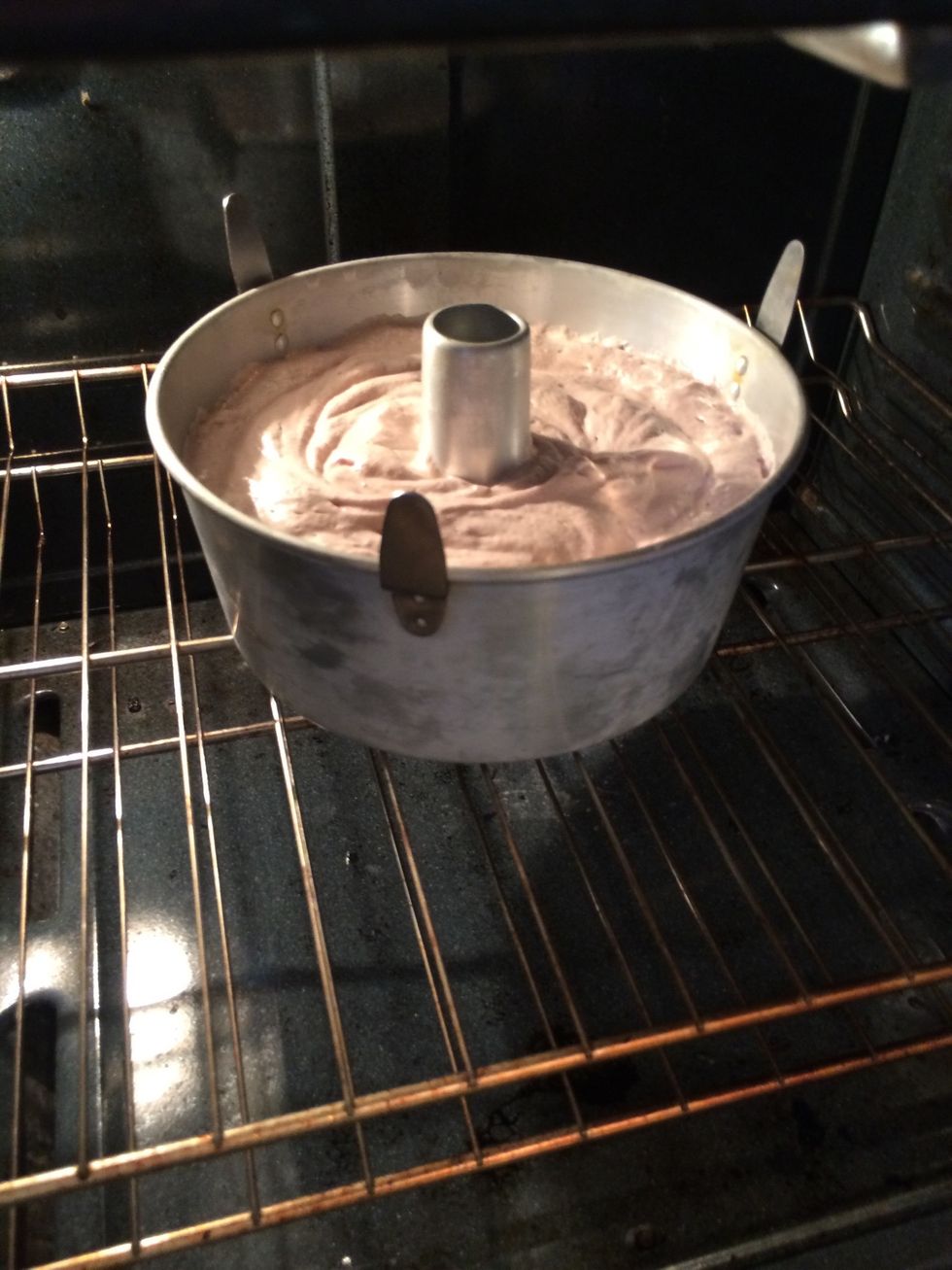 Place cake in the lower 1/3 of a preheated oven. 350f for 35-40 minutes. The cake will lightly spring back when touched.