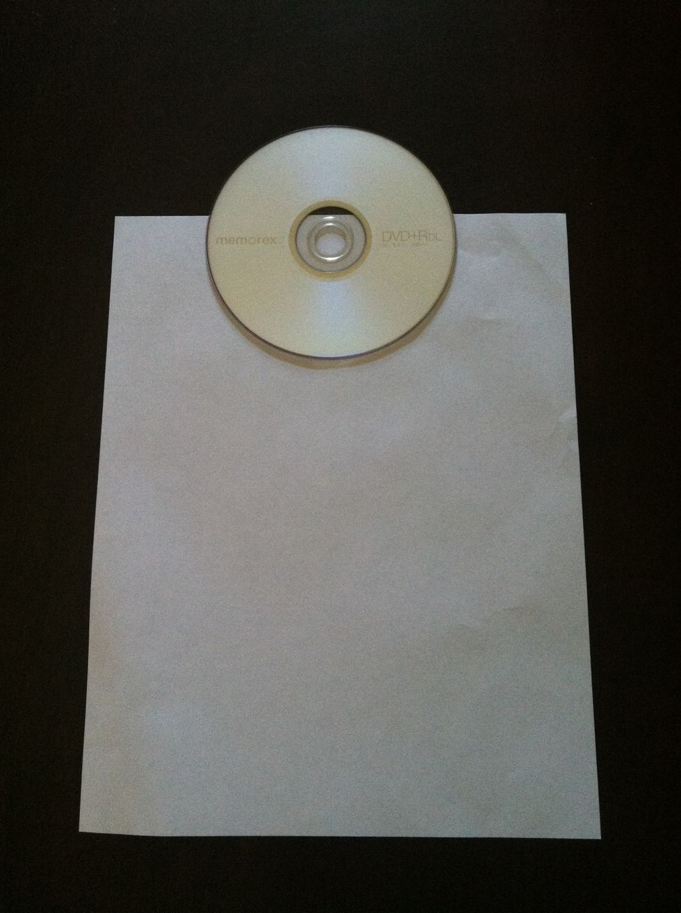 Place cd at in the middle, top edge of the paper