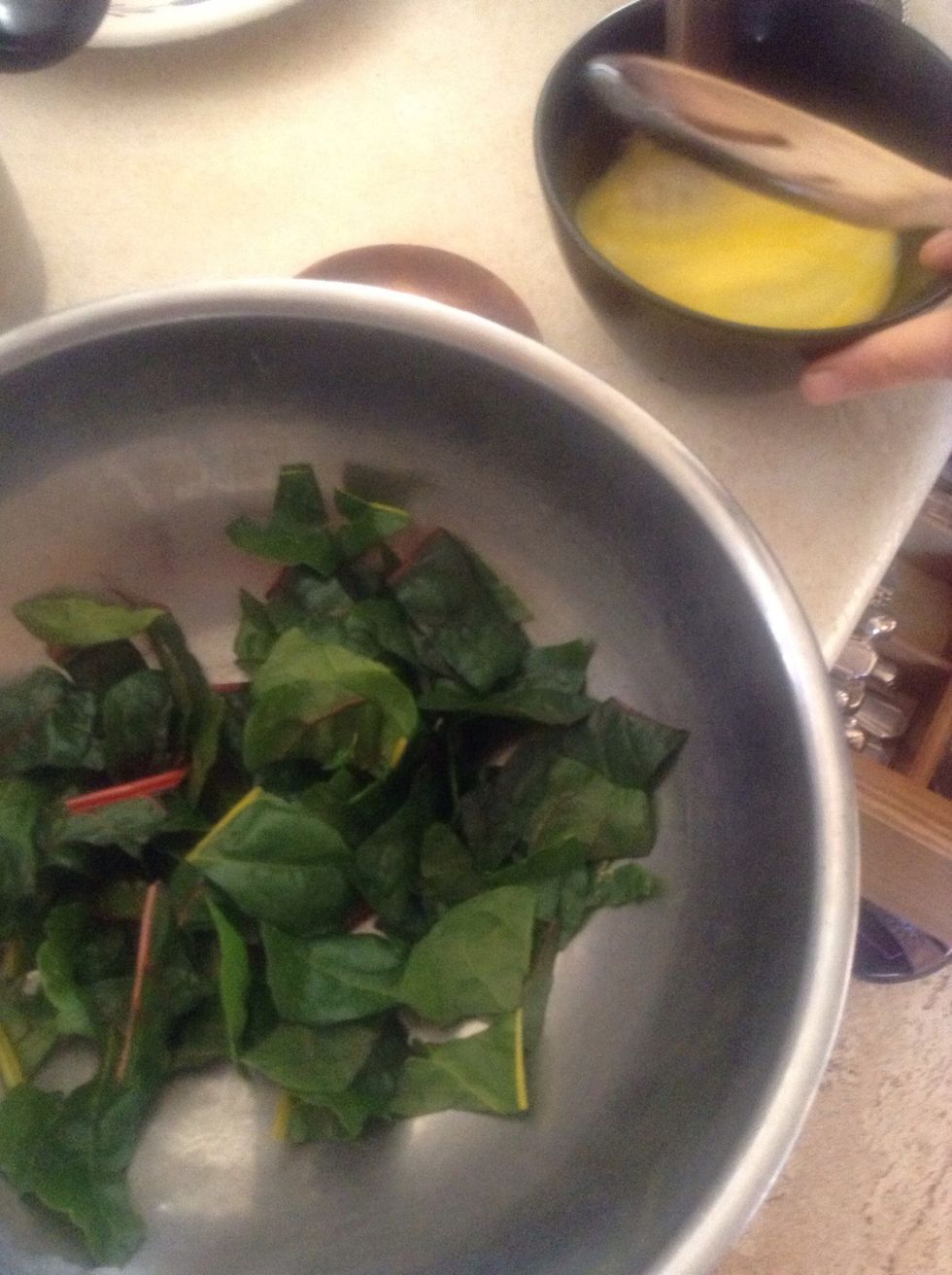 Place chard leaves in stainless steel bowl.