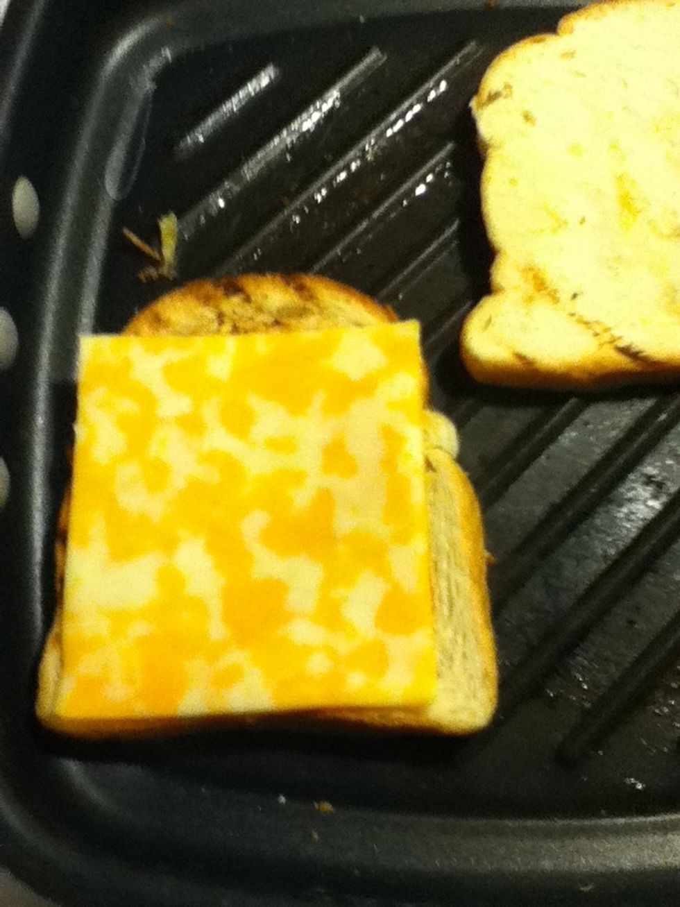 Place cheese one slice of bread