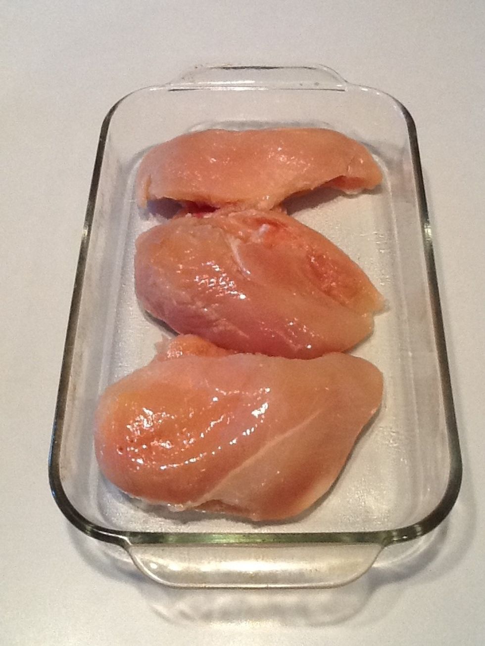 Place chicken breasts in the pan.
