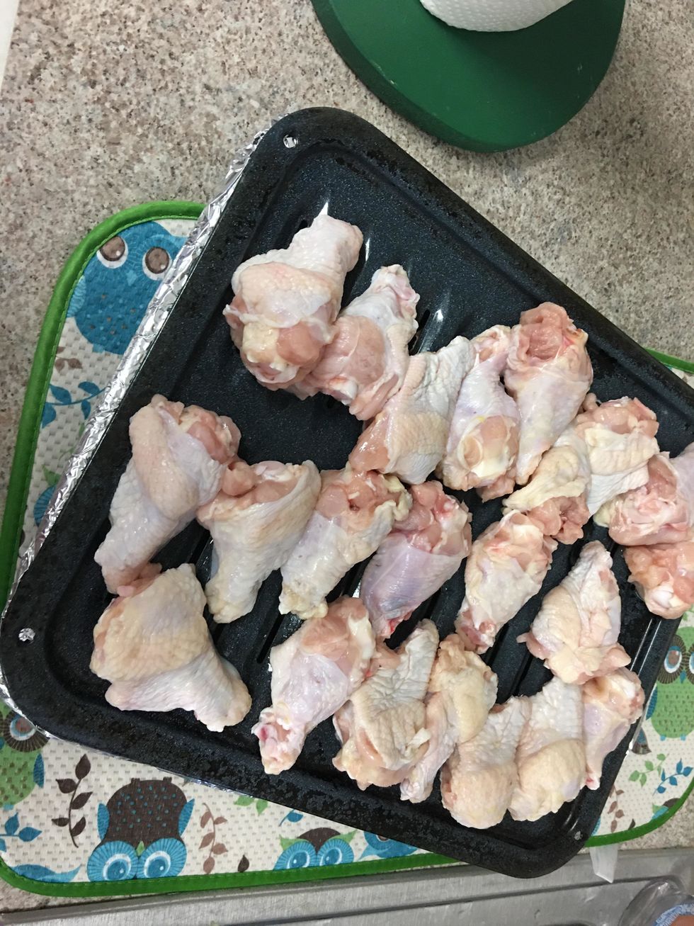 Place chicken wings on broiler pan in a neat arrangement.