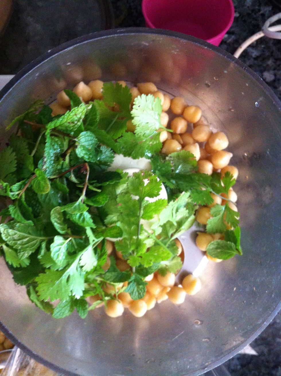 Place chickpeas, herbs, lemon juice, pistachios in a vitamix and mix