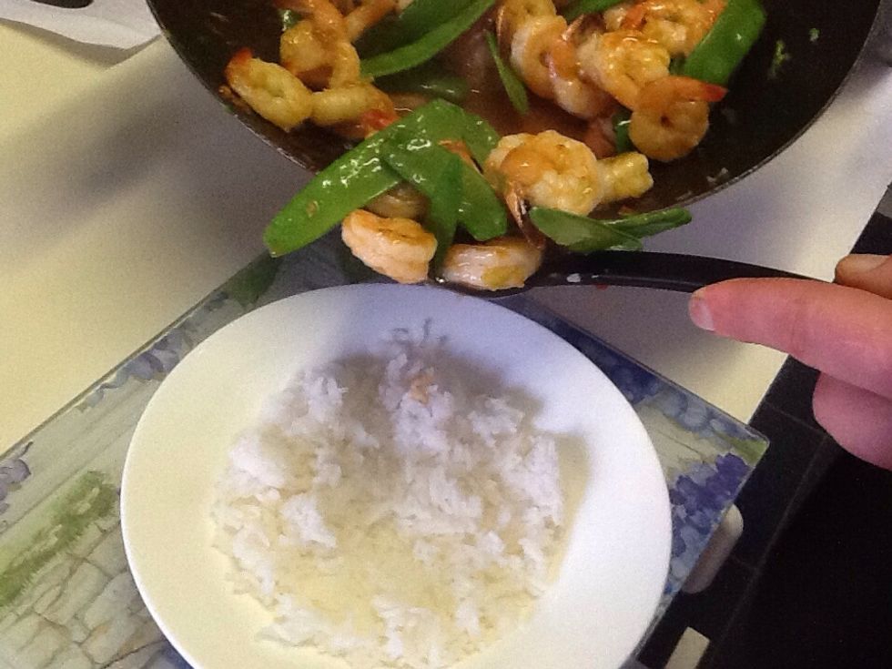 Place chilli prawns on top