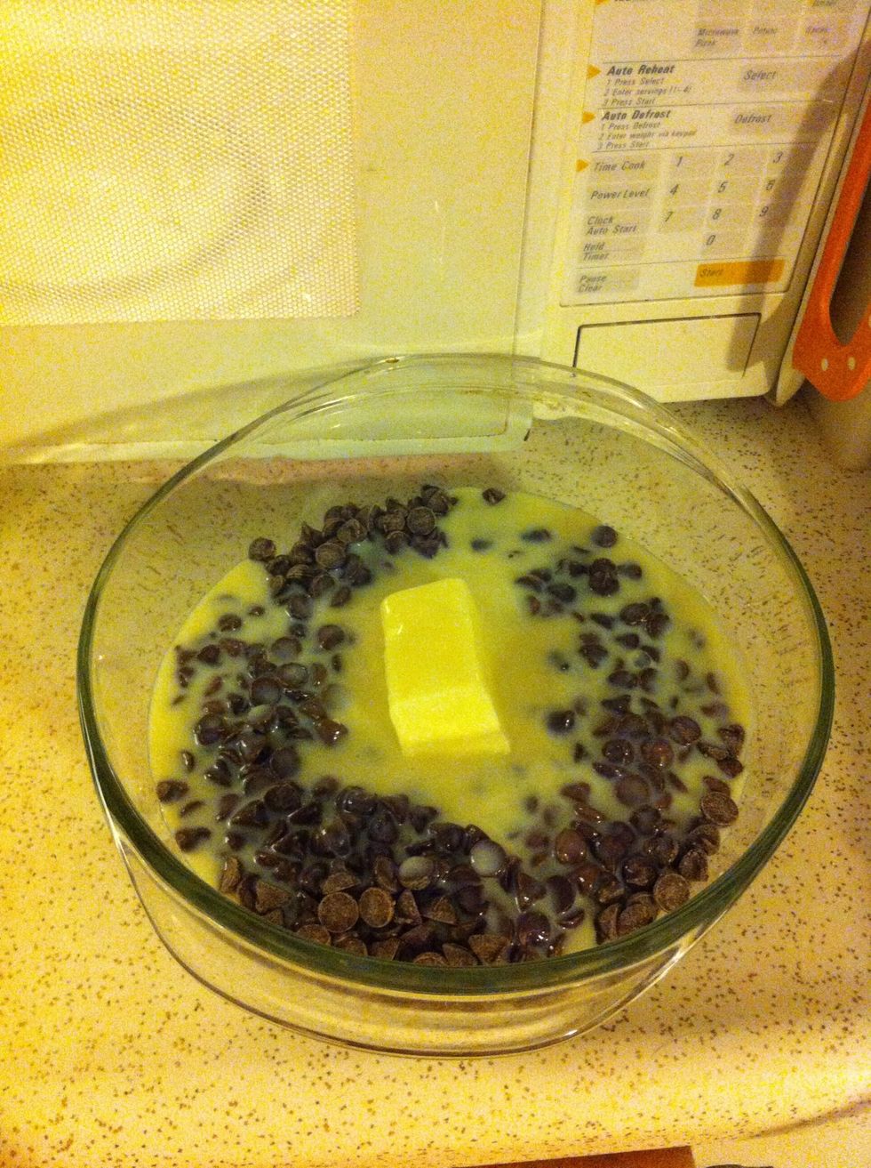 Place chocolate chips, butter, and condensed milk in bowl and microwave for 3 minutes. Stop to stir ever 30 seconds.
