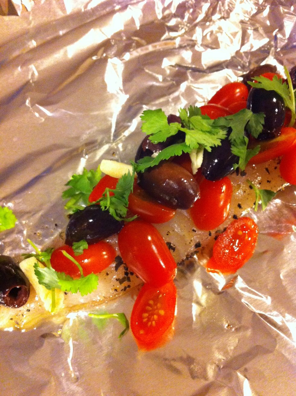 Place cilantro (or Italian parsley) and sliced garlic in the foil package. Make sure you take a moment to appreciate the contrast in color.