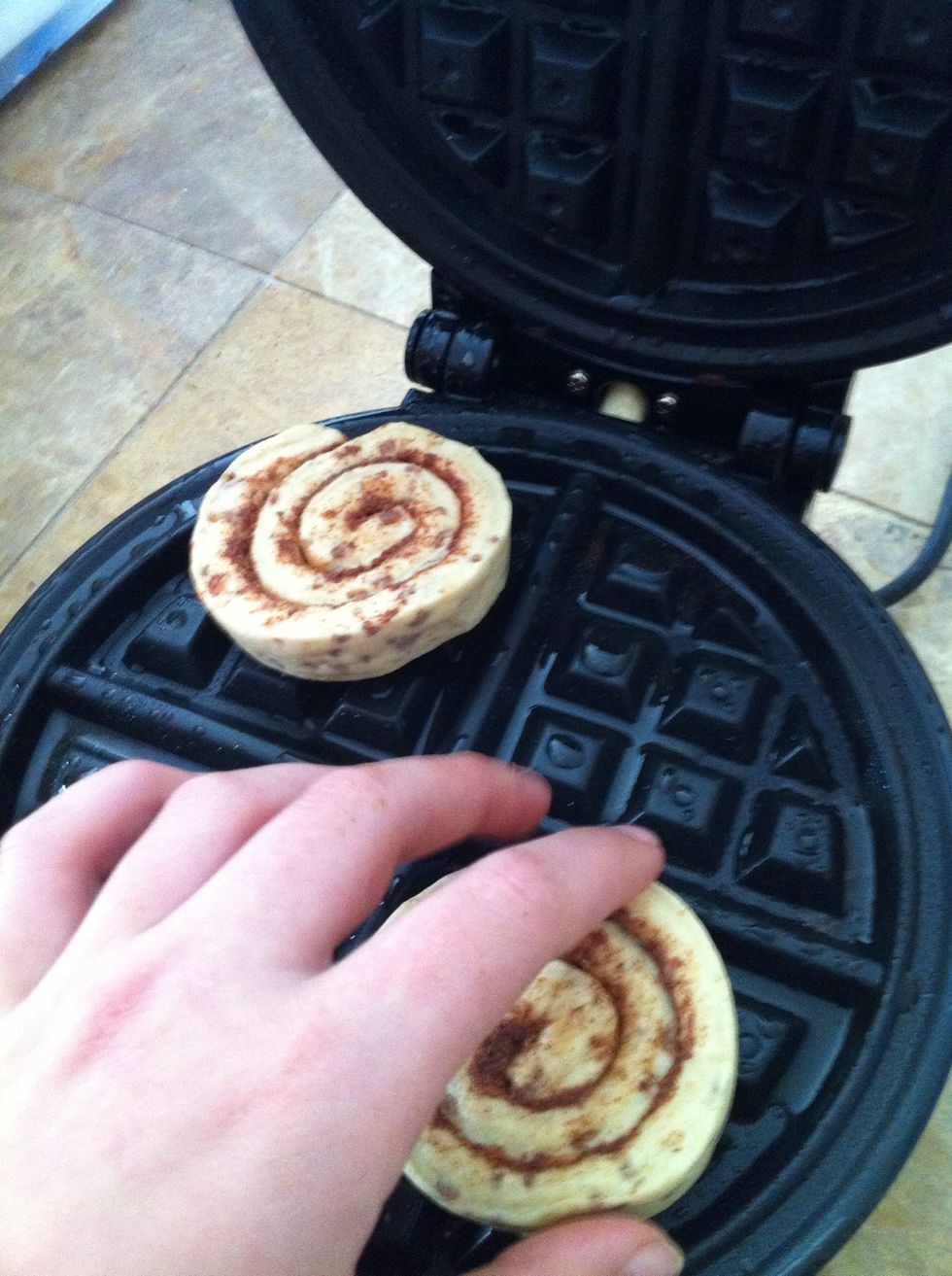 Place cinnamon rolls.....