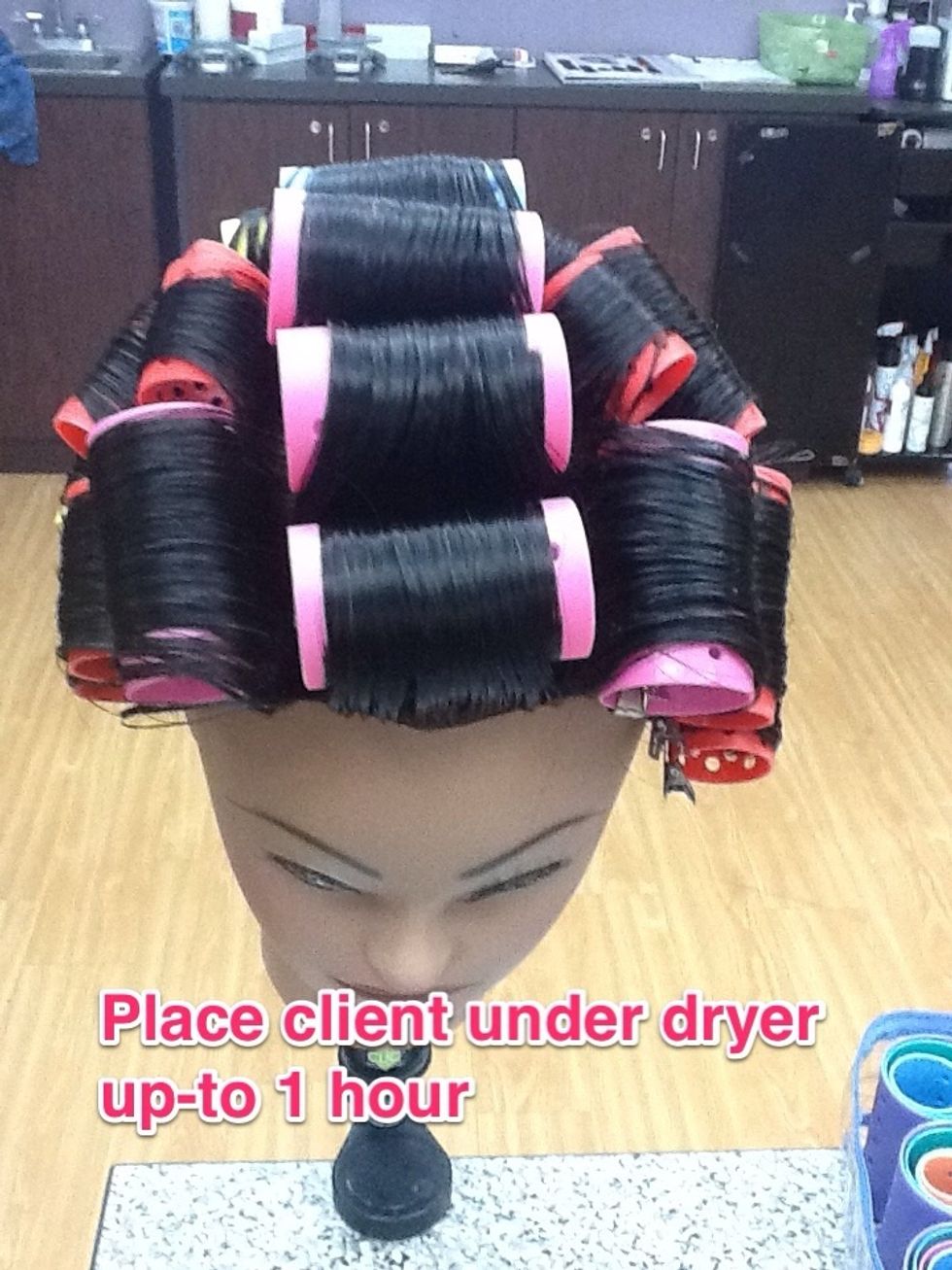 Place client under the dryer for up-to an hour depending on texture of the hair...