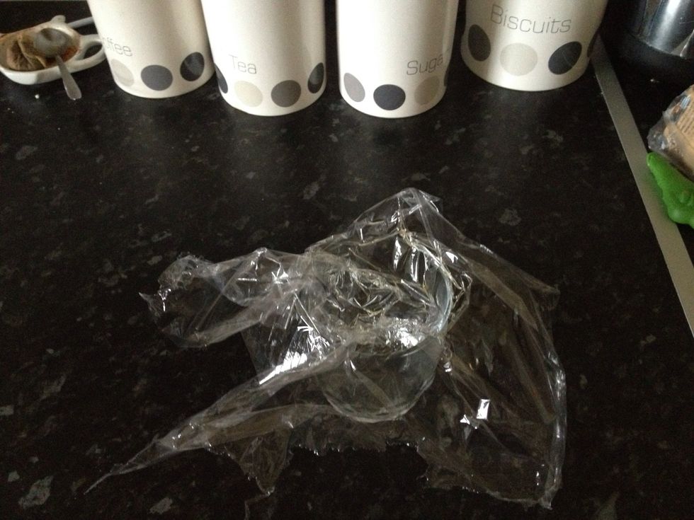 Place cling film over the glass