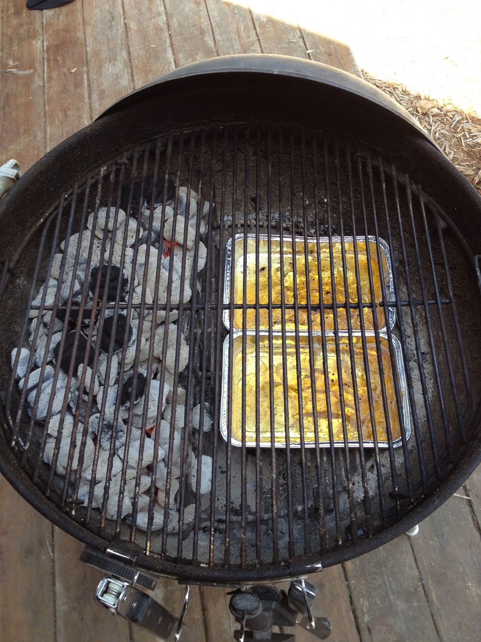 Place coals on one side (indirect heat); drip pans with beer (or other liquid) on the other.