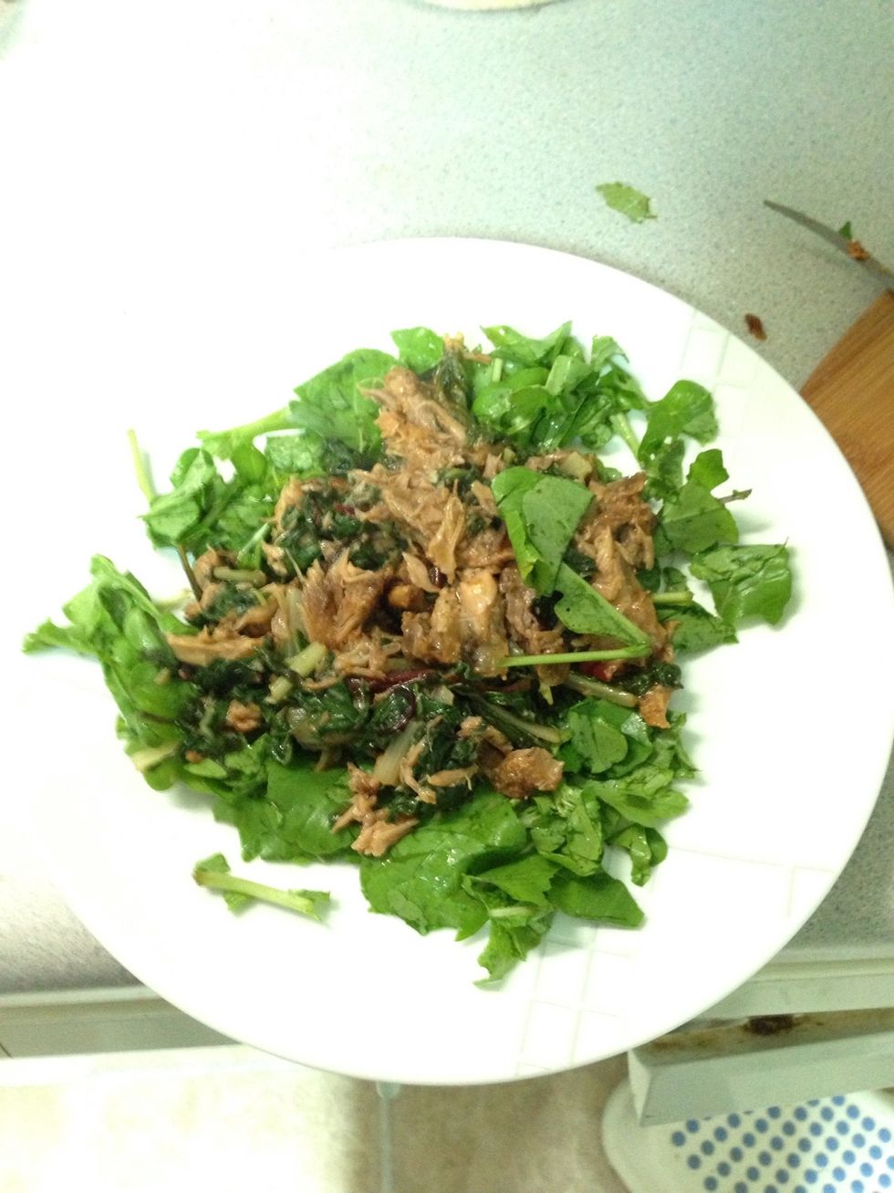 Place cooked chard and pork on top