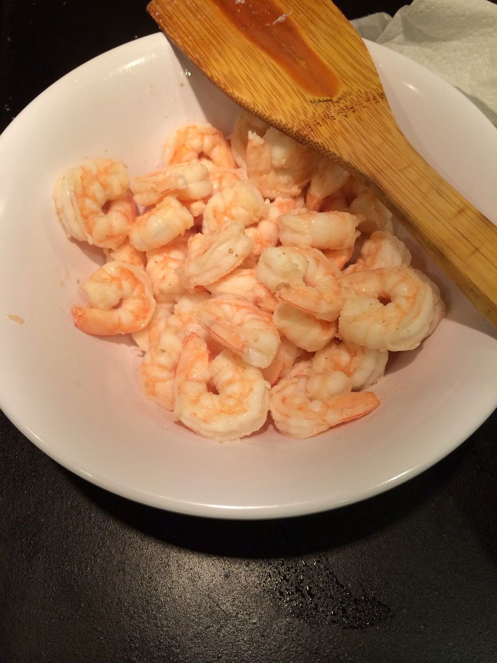 Place cooked shrimp aside in a bowl.