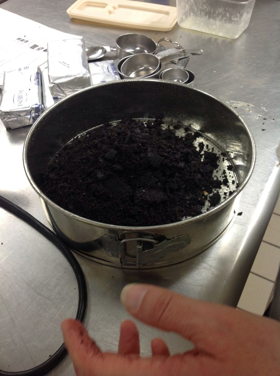 Place cookie mixture into a cheesecake pan.