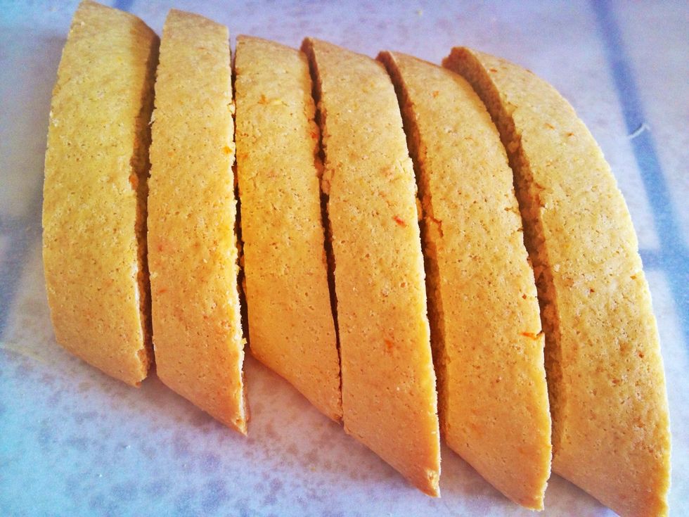 Place cooled biscottis on parchment paper.