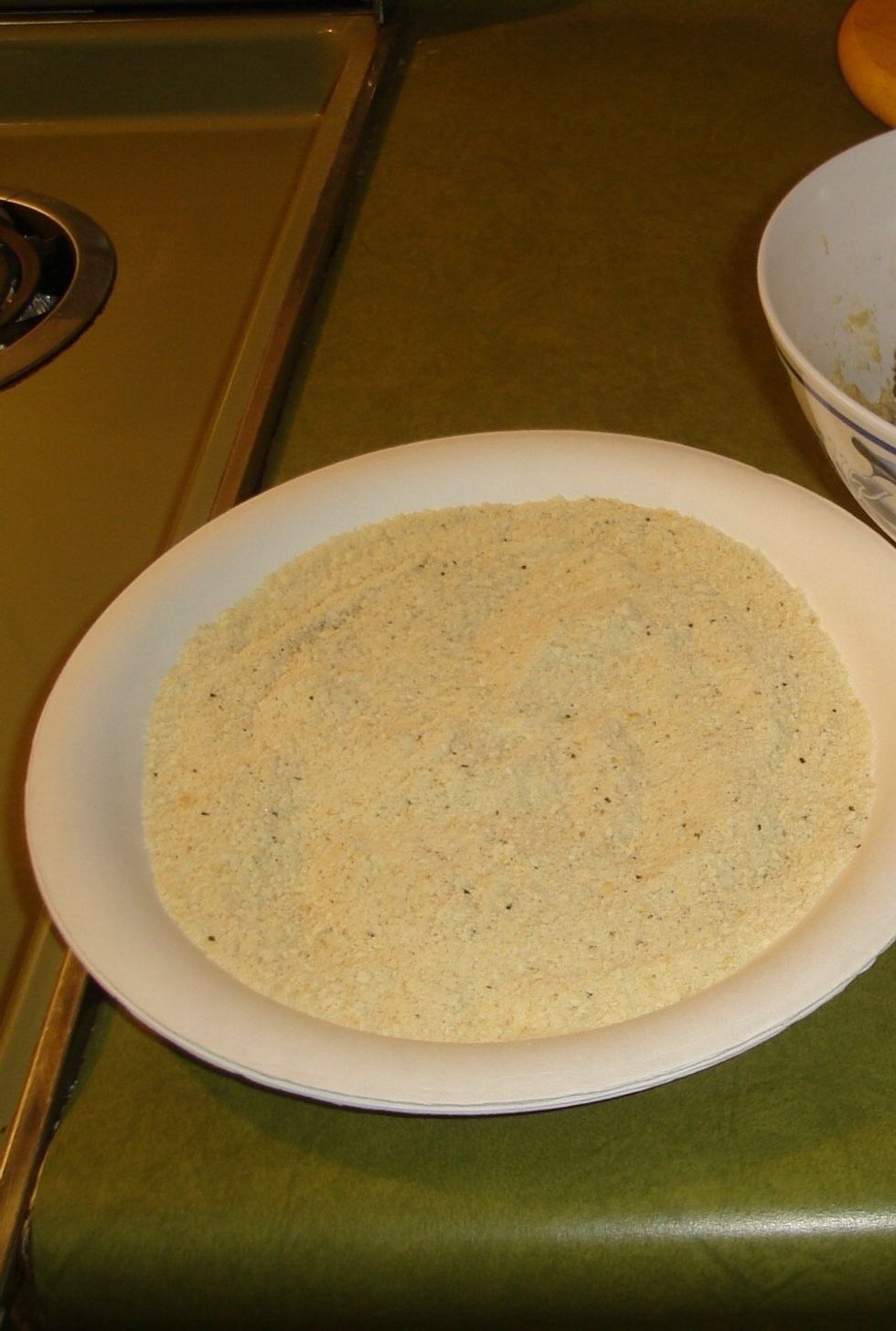 Place cracker crumbs in a plate and lightly season with salt & pepper.