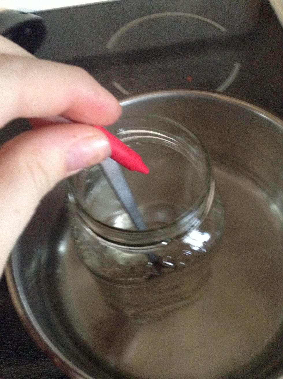 Place crayon chunks in jar