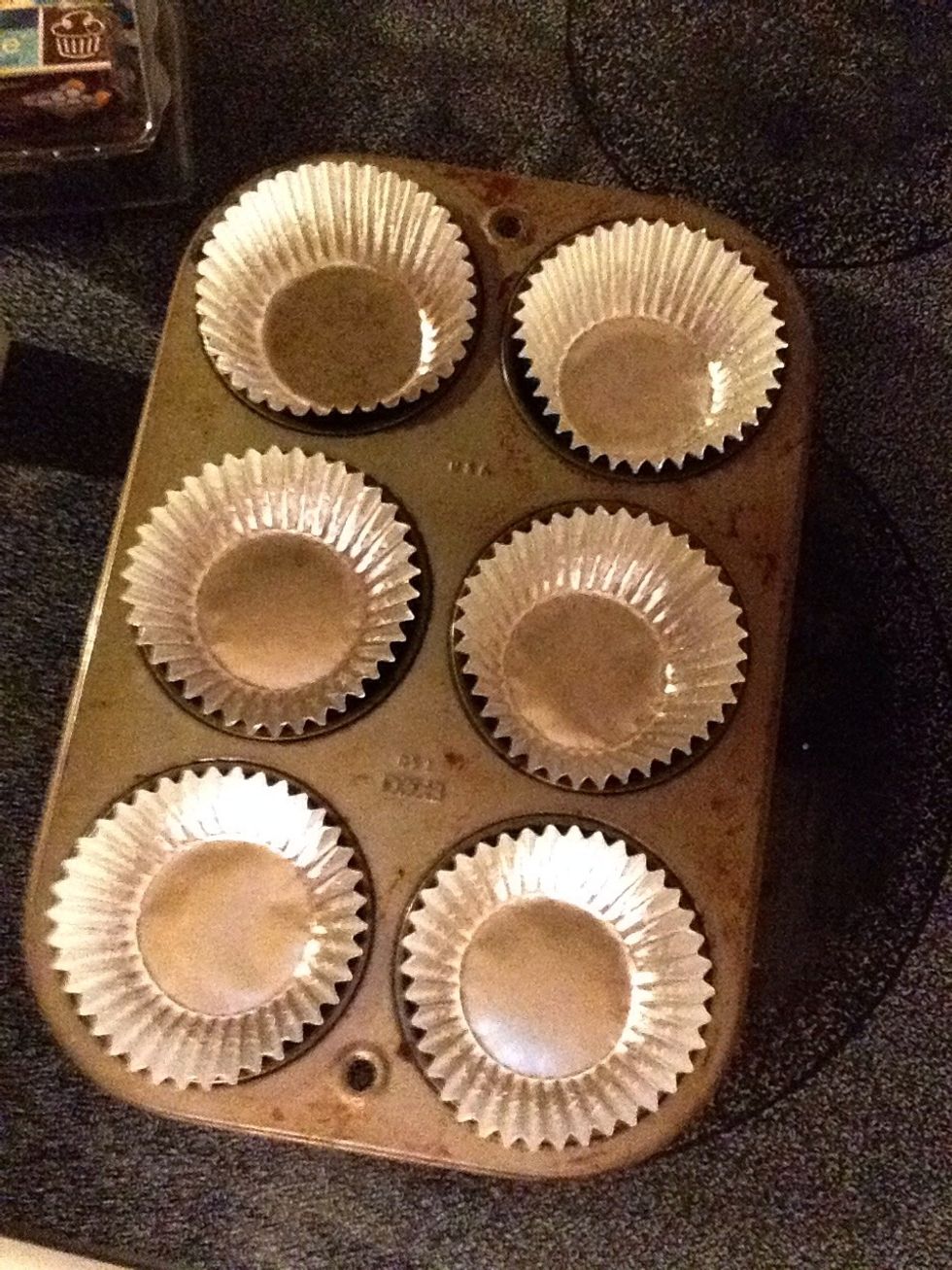 Place cupcake tins in the cupcake holders