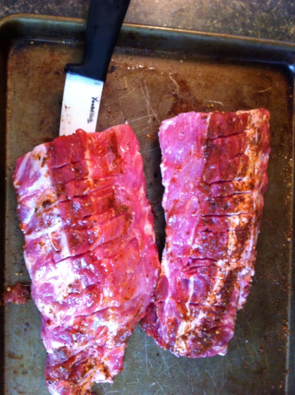 Place cut marks in between each rib and up and down the front side of the ribs.