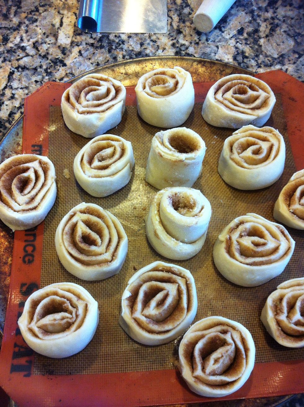 Place cut rolls on a lined baking sheet. You don't want them touching..they bake up and will need that room to properly bake fully.