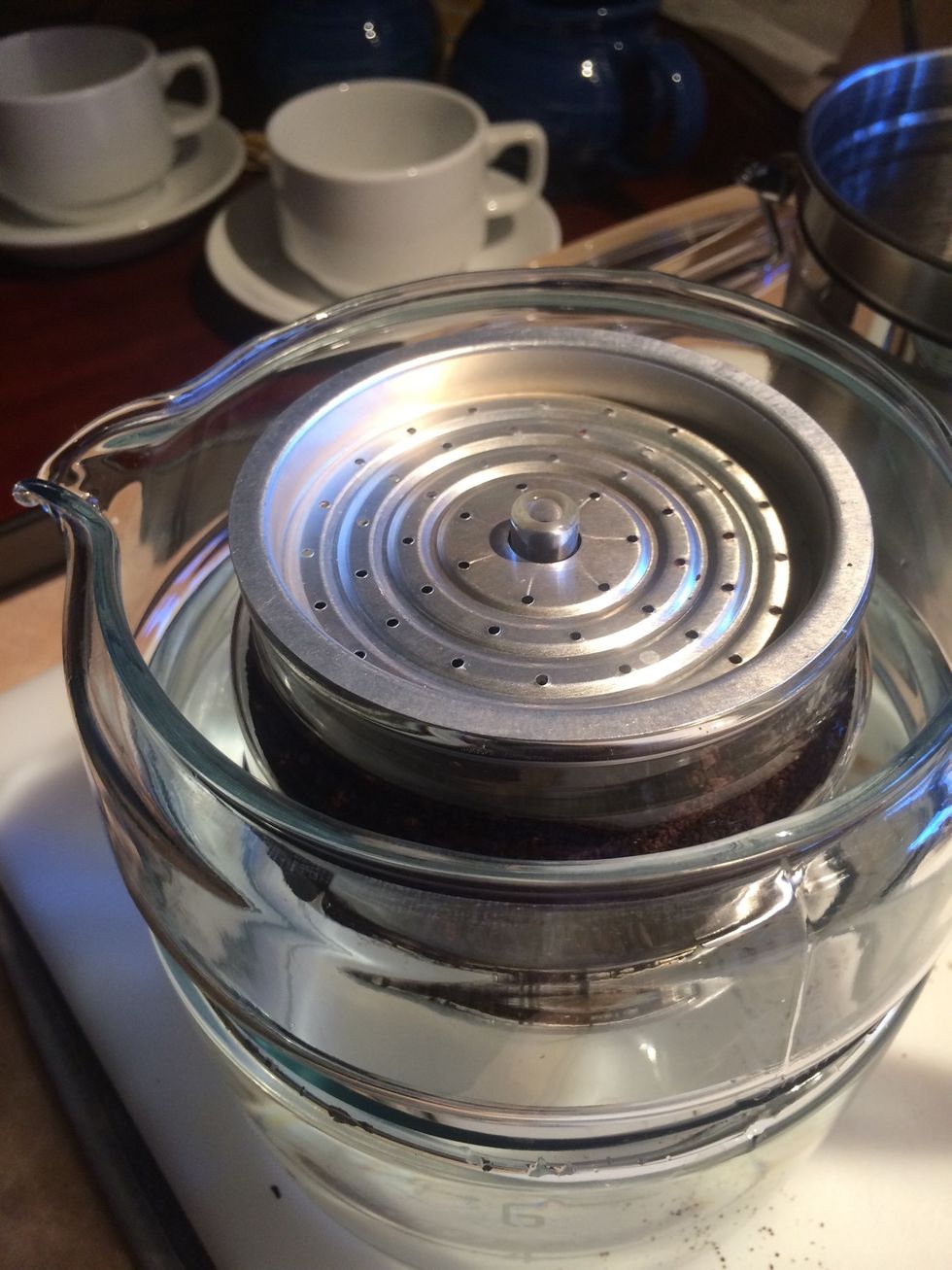 Place diffuser on top the brew basket.