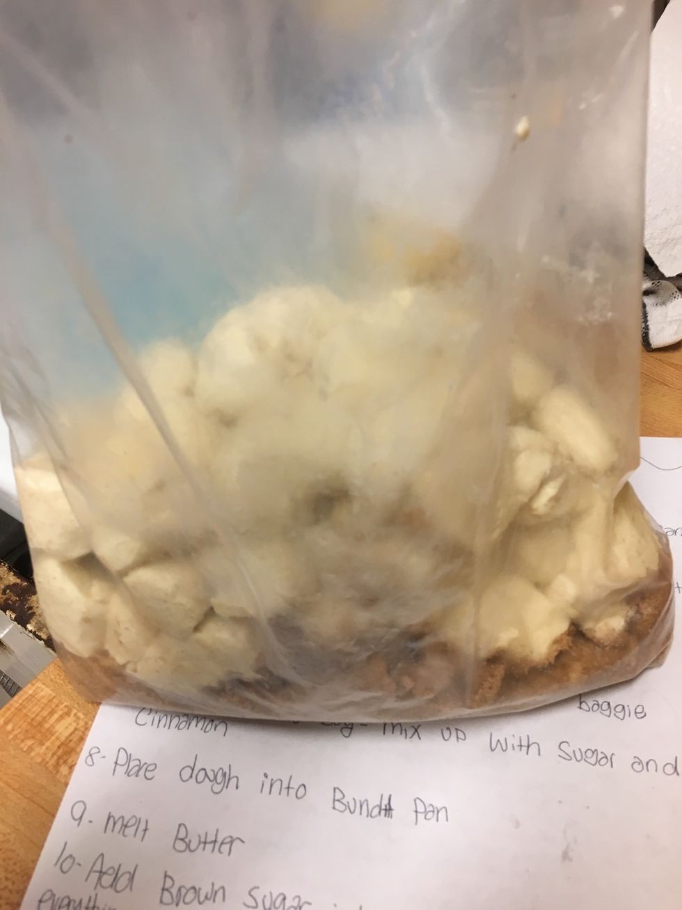 Place dough in bag with the mixed cinnamon and sugar