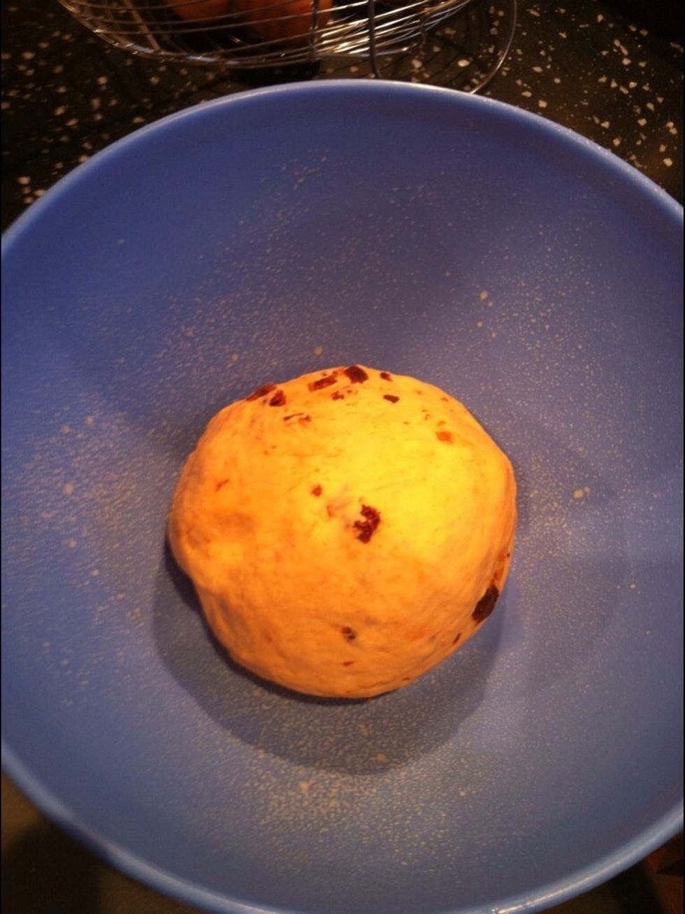 Place dough into a lightly oiled bowl