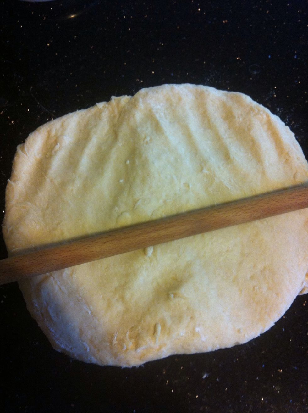 Place dough on a lightly floured surface, and flour your roller as well.