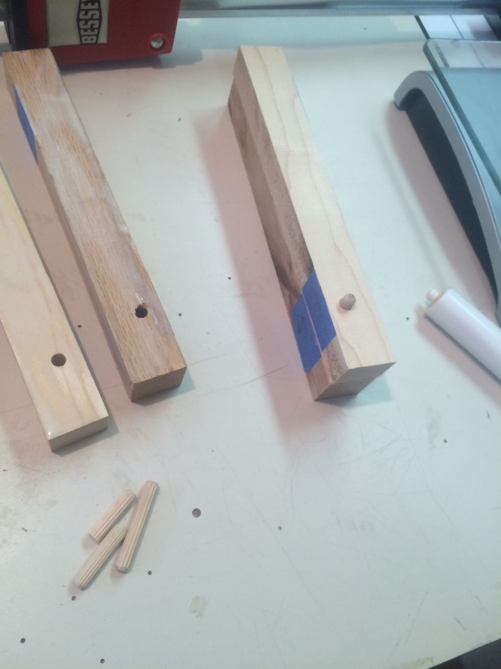 Place dowel in piece "H" and add piece "G"