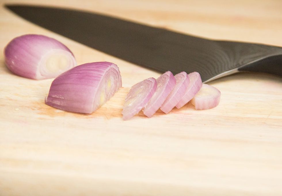 Place each half flat-side-down on the cutting board and cut thin slices.