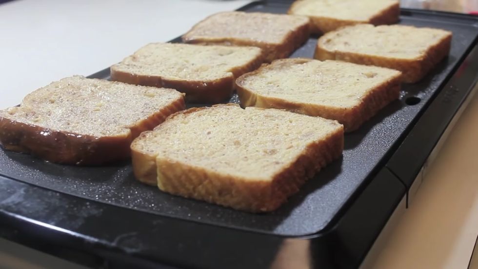 Place each slice onto the griddle ,flip the toast until golden on both side