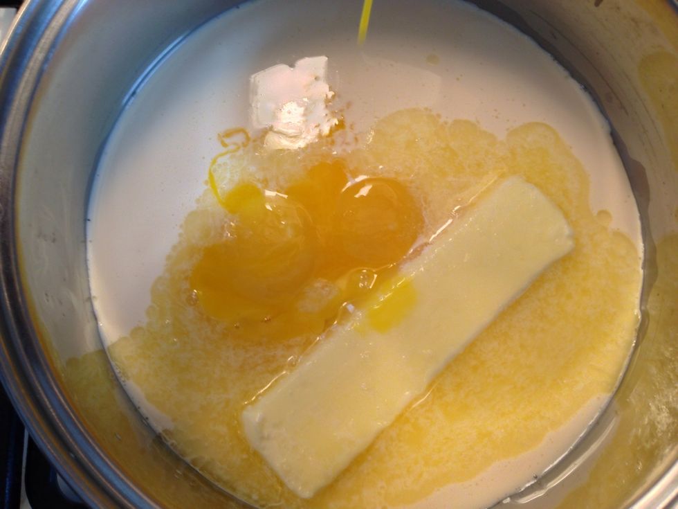 Place egg yolks, sugar, butter and evaporated milk in a medium sized sauce pan.