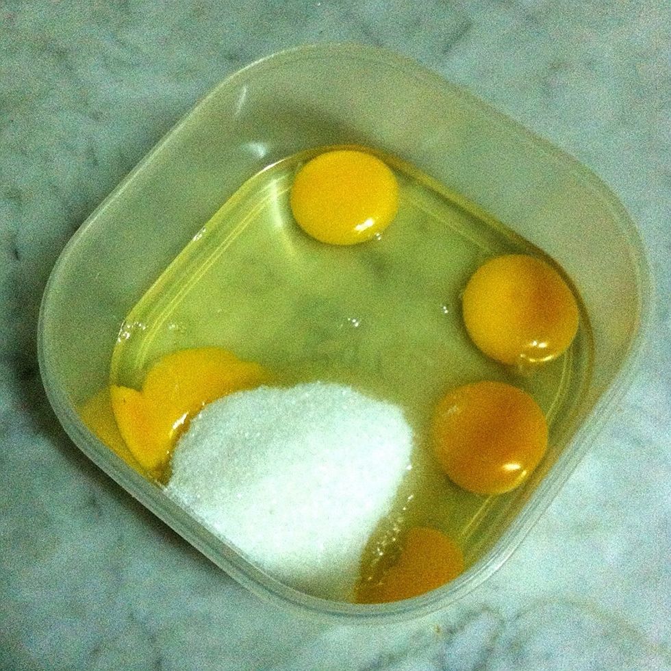 Place eggs and sugar in a bowl.