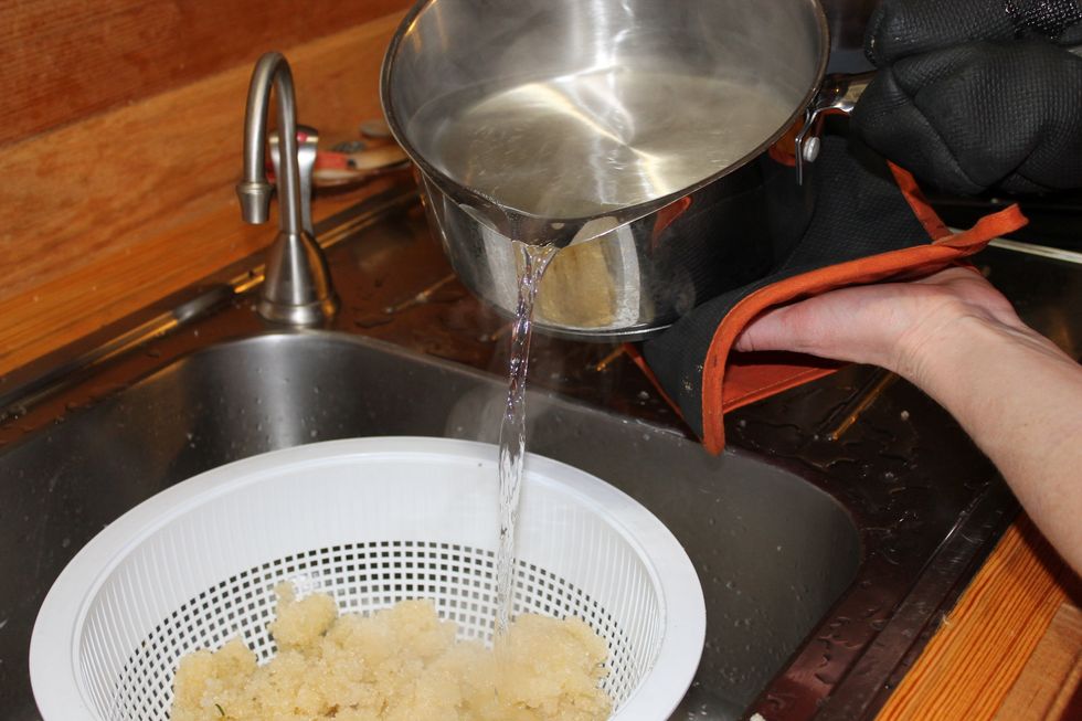 Place eggs in colander, pour boiling water throughout eggs evenly allowing them to be blanched.