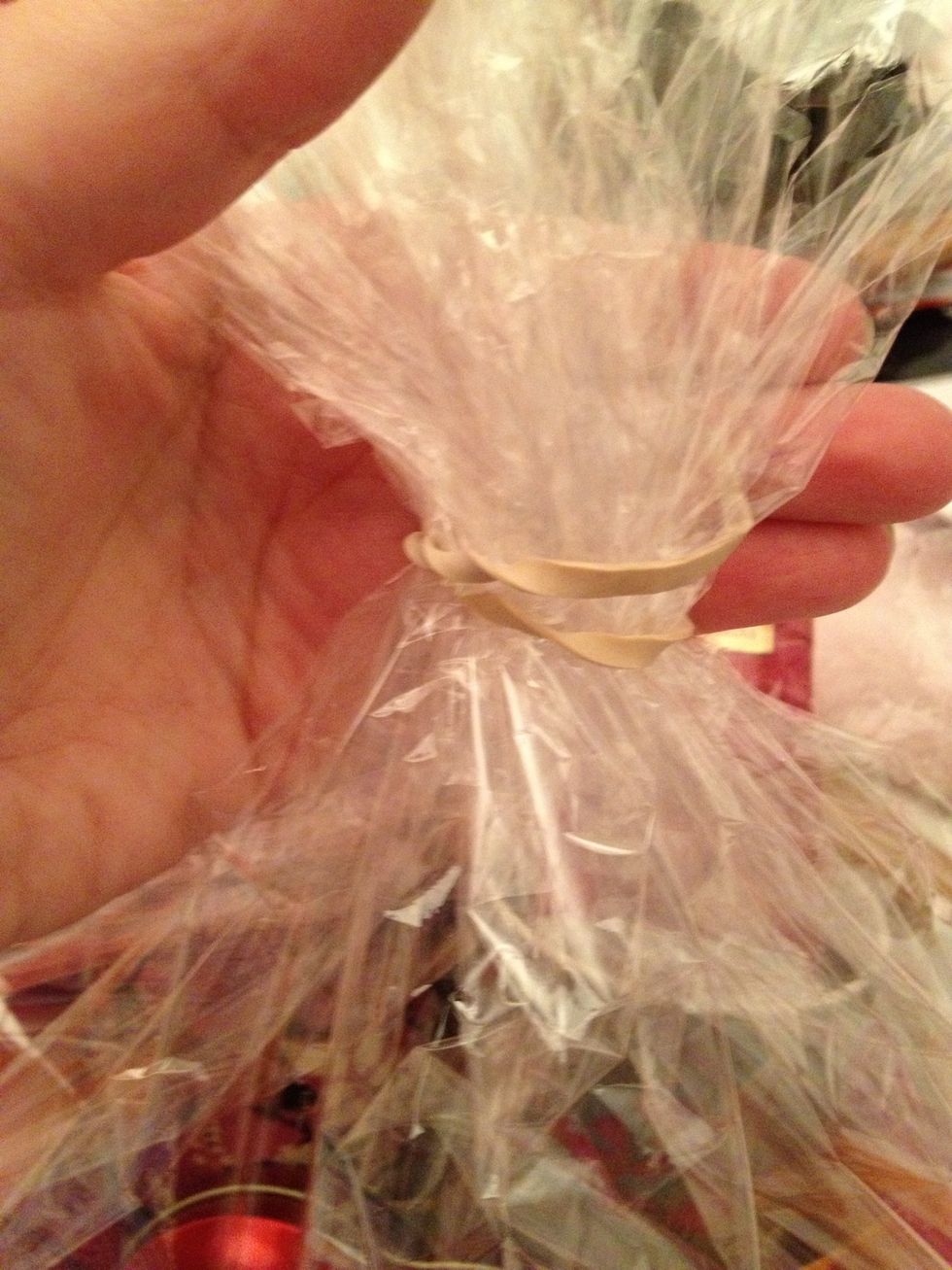 Place elastic band at the top