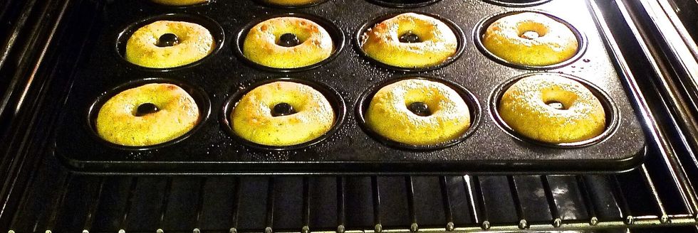 Place filled doughnut pan on the middle rack of the 200 degree C preheated oven. Bake doughnuts 8-9 minutes until doughnuts are golden brown and spring back when touched.