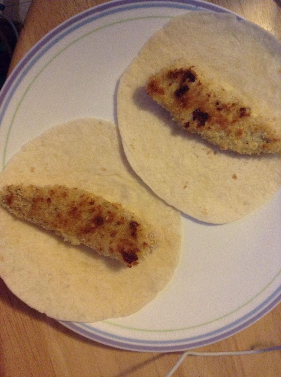 Place fish on warm flour tortillas