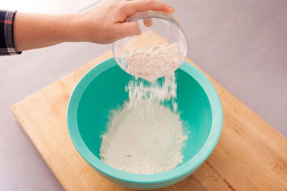 Place flour in a large bowl.