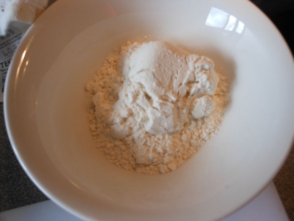 Place flour in a separate bowl.