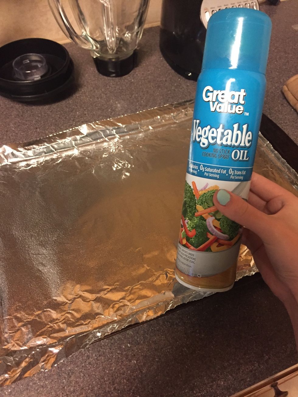 Place foil on pan and and spray with vegetable spray so the cookies will be easier to get off the pan