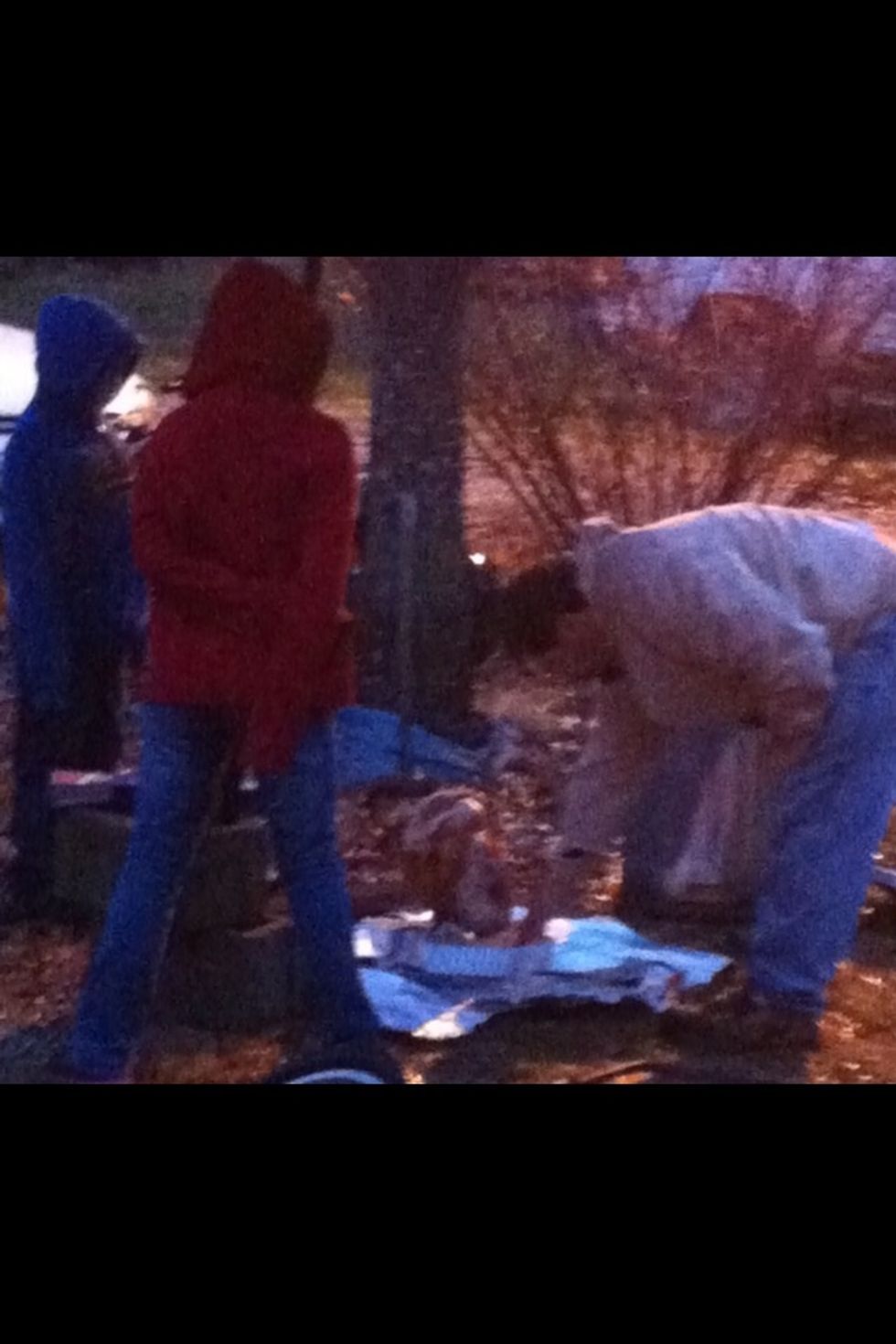 Place foil pans under turkey to catch drippings so fire doesn't go out.