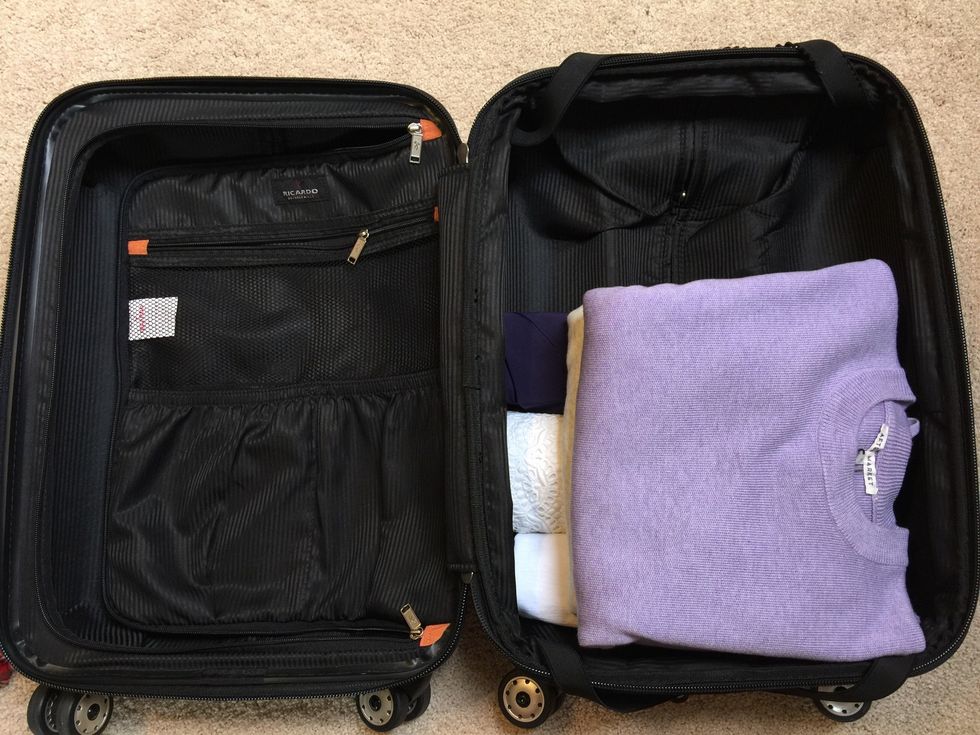 Place folded items on top.