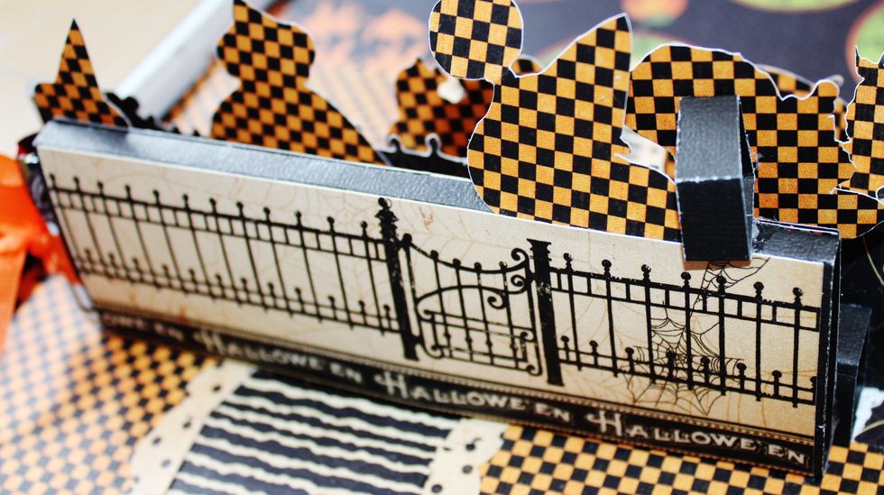 Place formed candy box holder to inside of card.