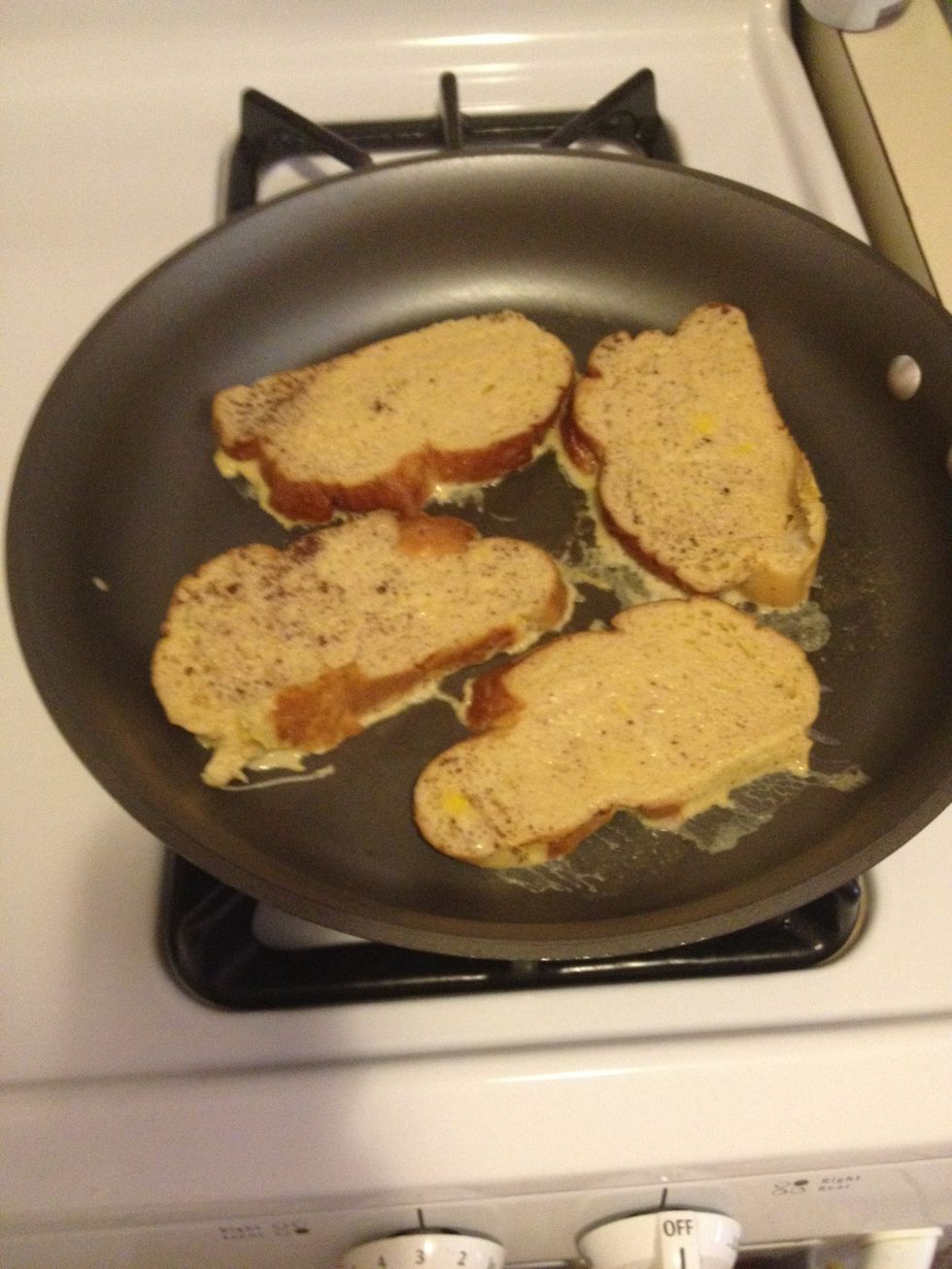 Place French toast into pan. Turn after 5 minutes or until golden brown.