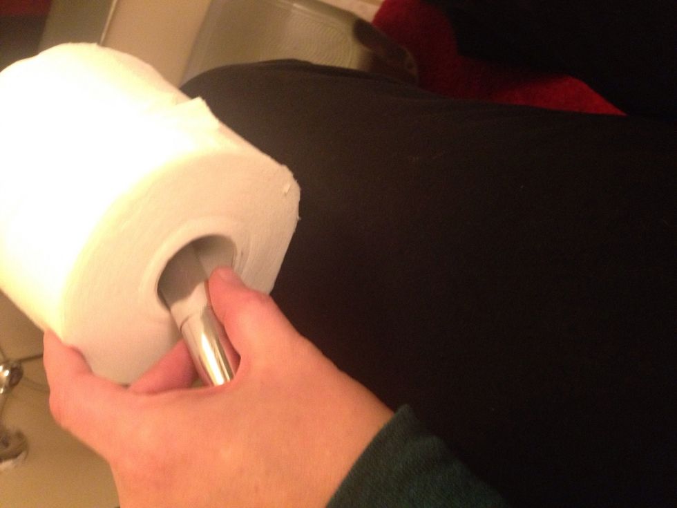 Place fresh roll onto bar, being sure that the toilet paper will pull in the way you desire, over or under, we use over.